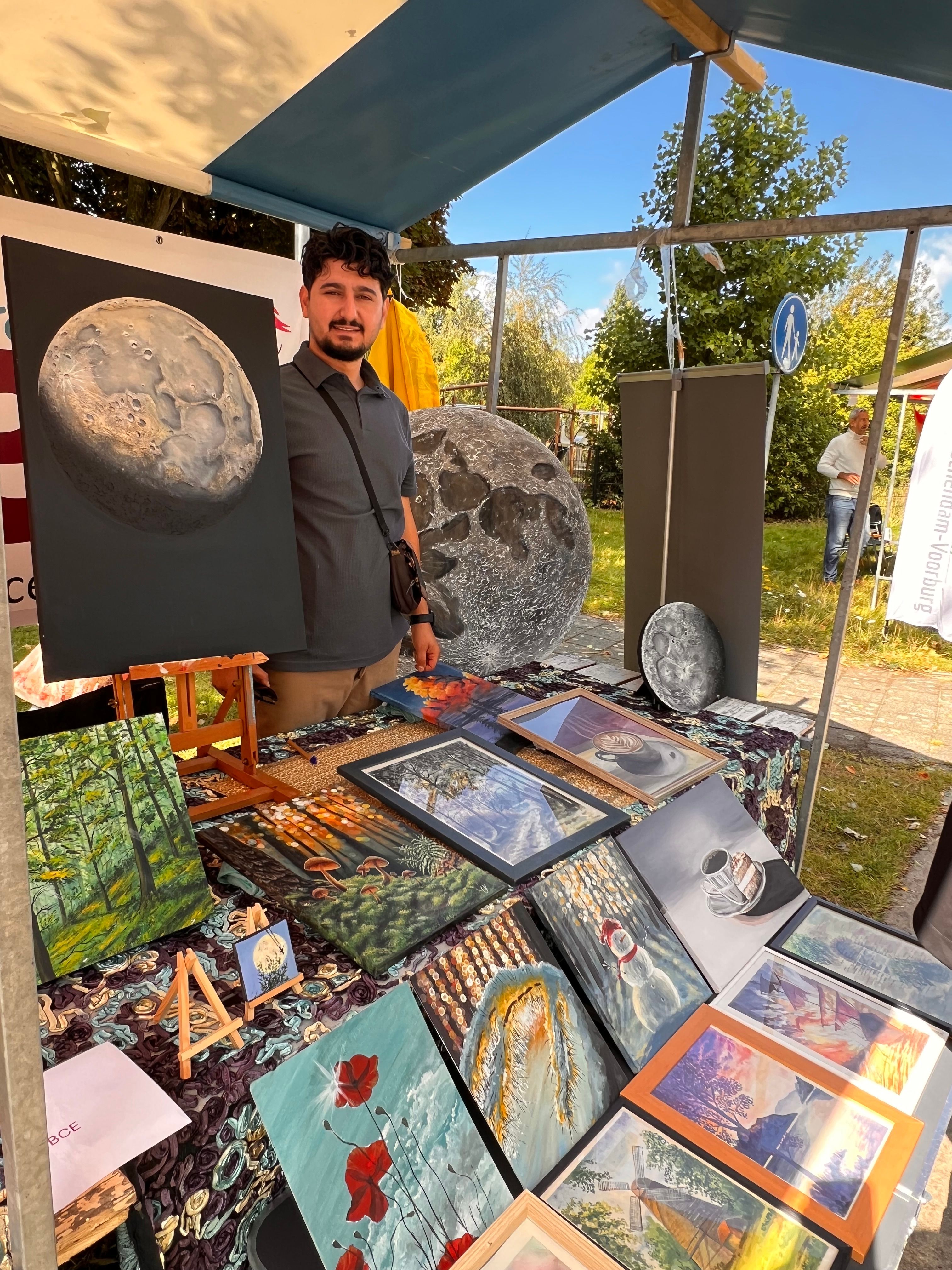 Yasin's paintings displayed at the Gemeente NGO exhibition