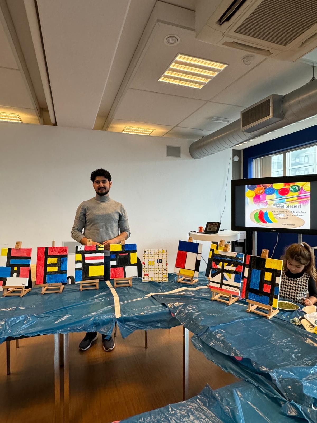 Children painting at a workshop hosted by Voorburg Library